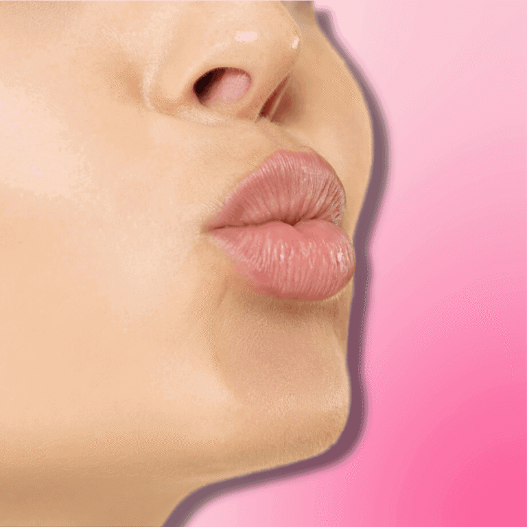Close up of a woman pouting with pink lips