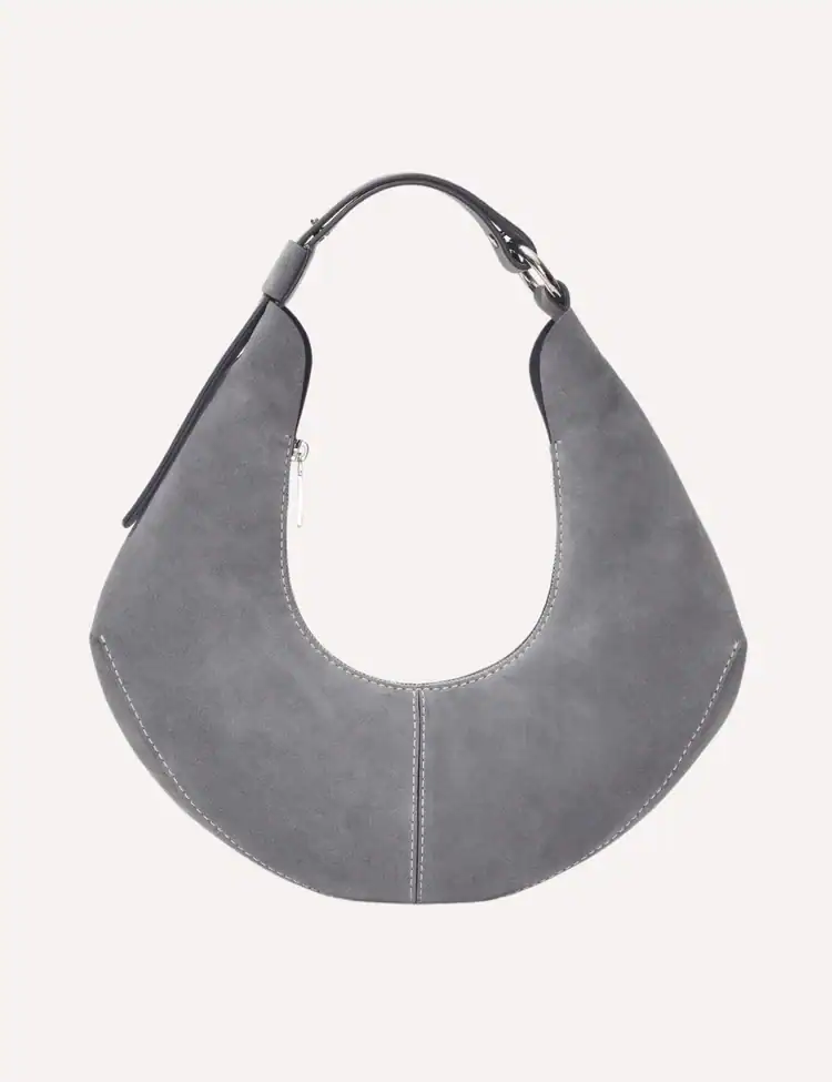 grey moon-shaped handbag. TikTok’s ‘Groutfit’ Trend