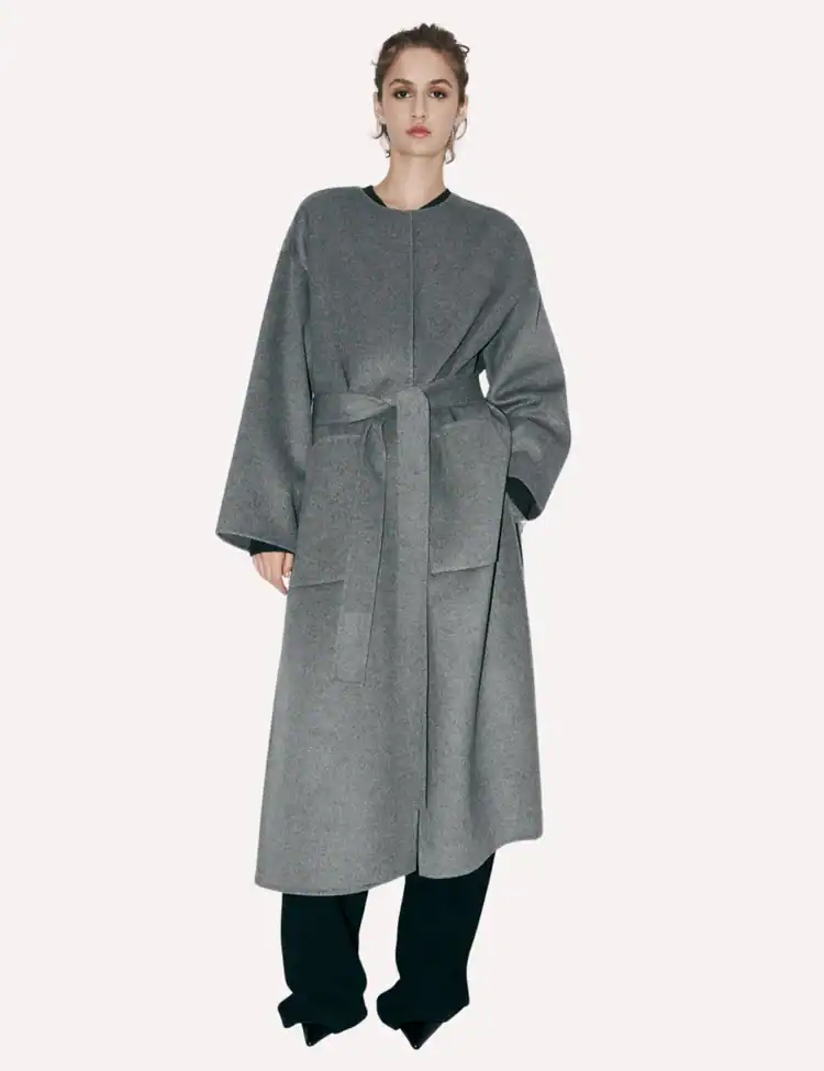 model wearing a grey wool blend coat. TikTok’s ‘Groutfit’ Trend