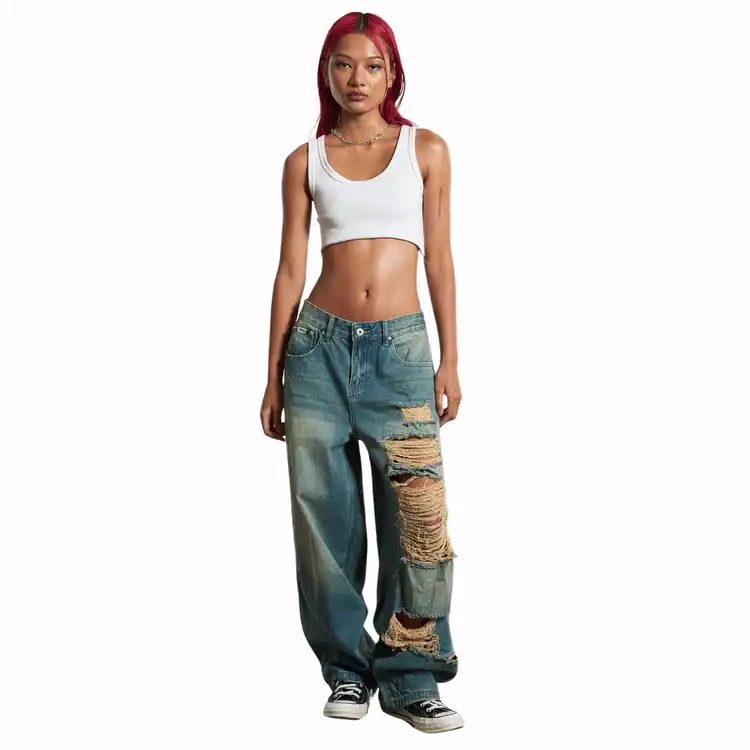 model wears distressed jeans