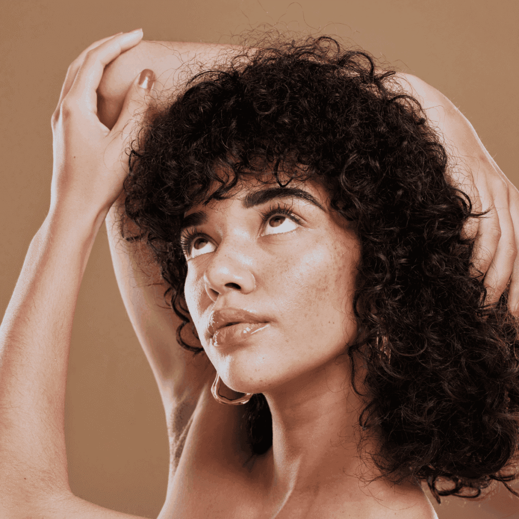 woman with hyperpigmentation looking up