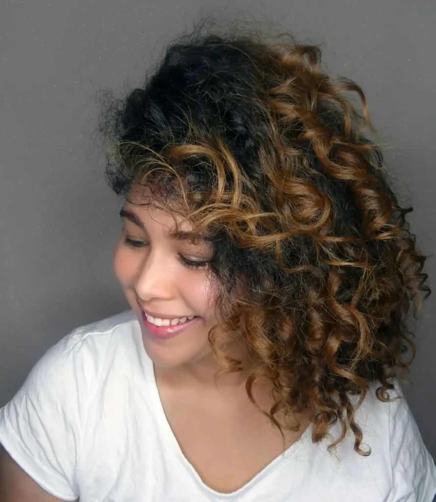 happy woman with curly hair