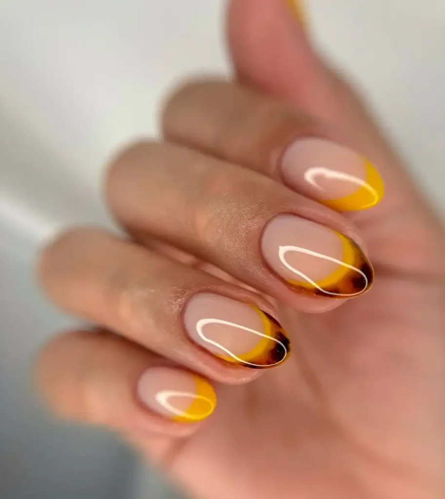Yellow and tortoiseshell nail design