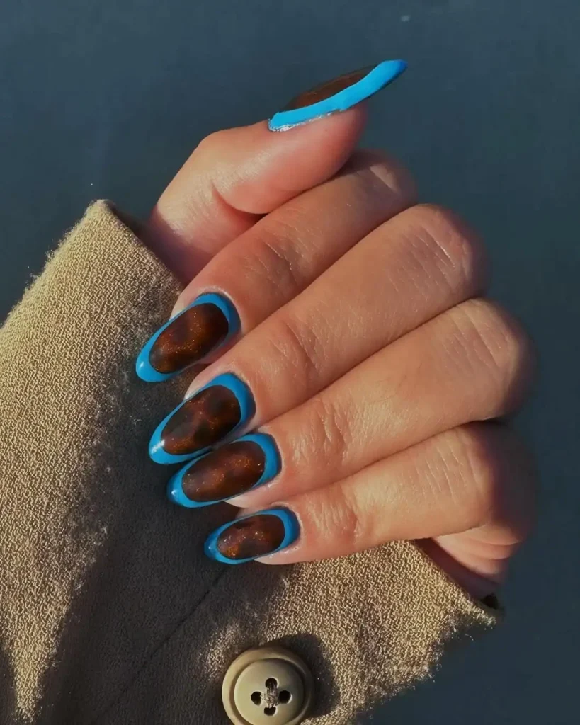 Blue framed tortoiseshell nail designs