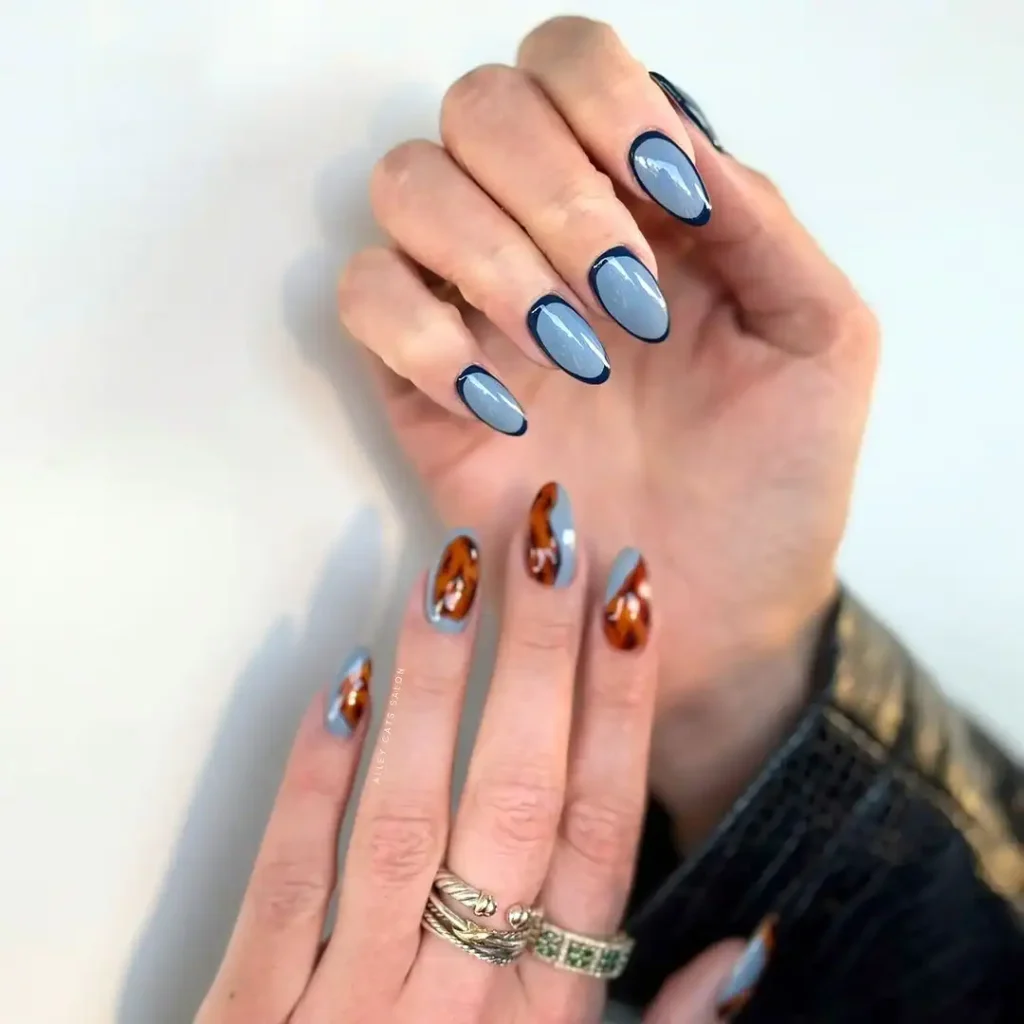 Powder blue tortoiseshell nail art