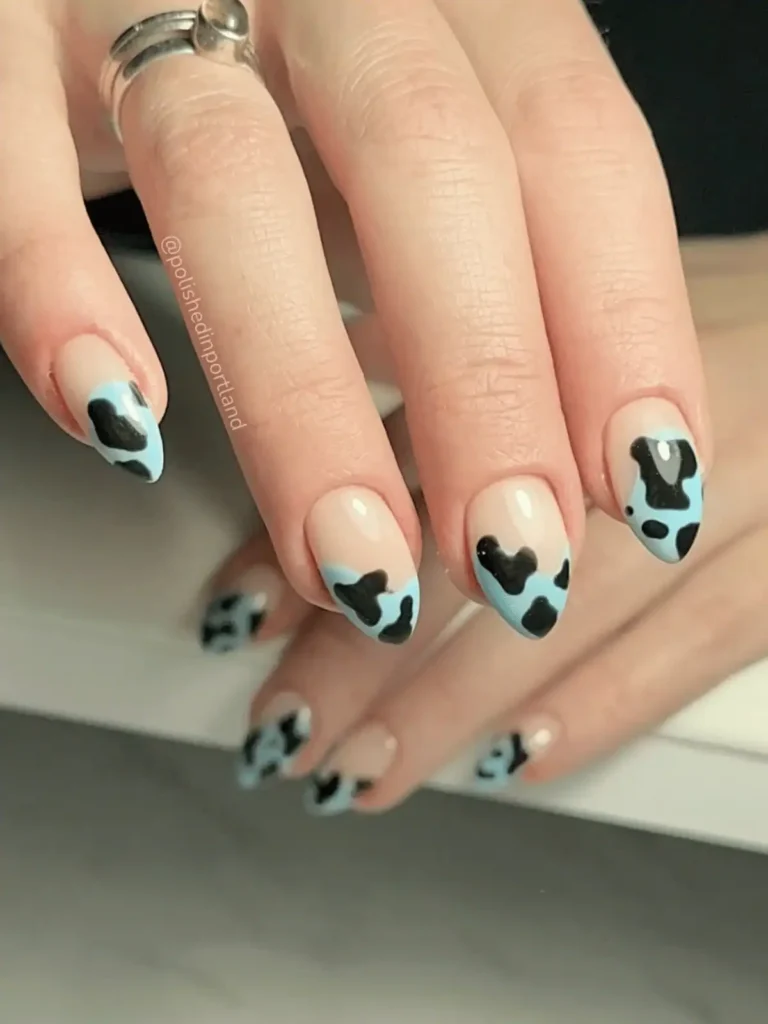 blue and black cow print French tips