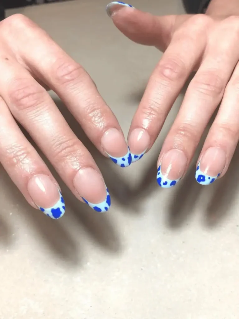blue cow print French tips