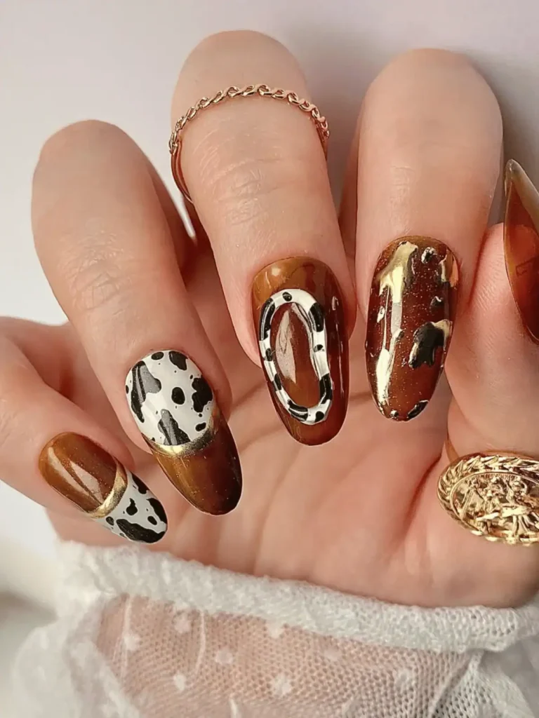 brown and gold cow print nails