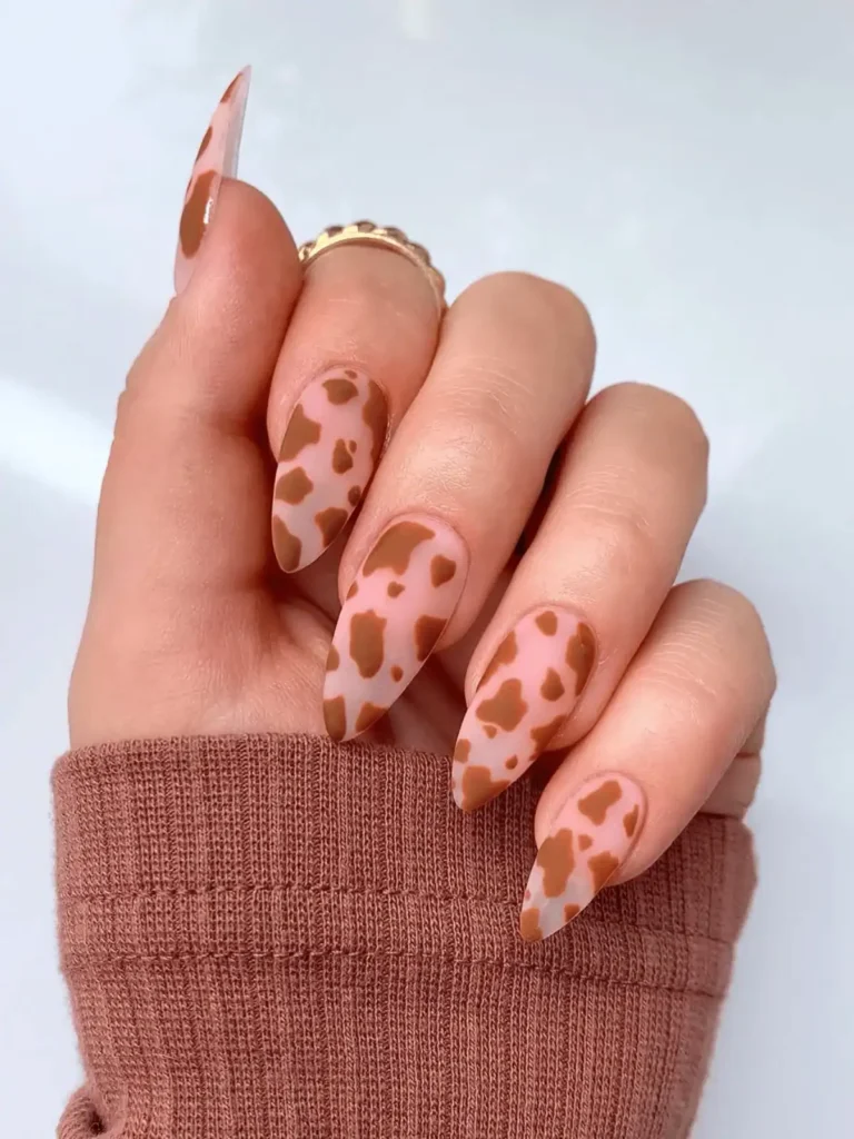 brown and transparent cow print nails