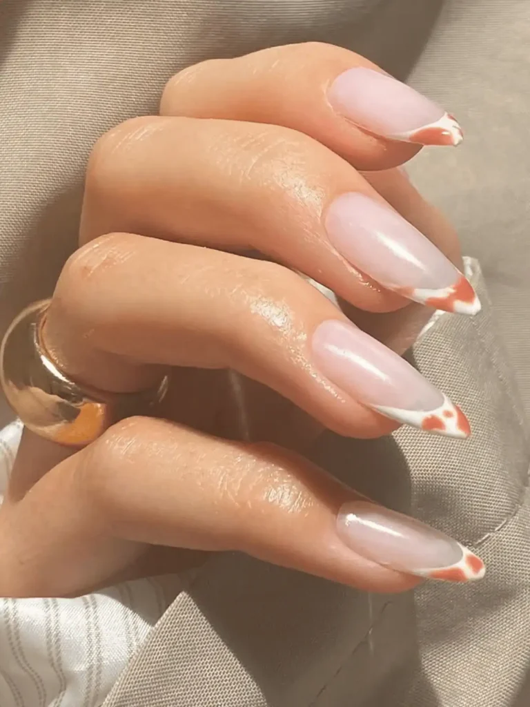 brown cow print French tips