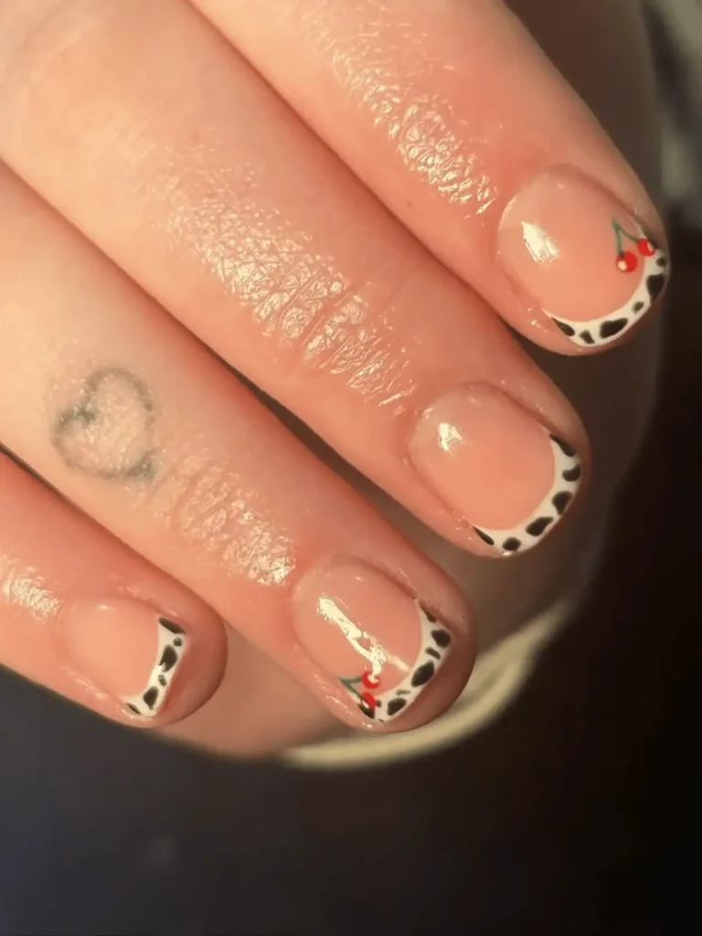 cherry cow print nails