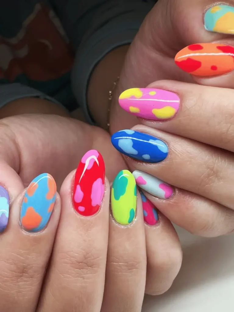 mixed colour cow print nails