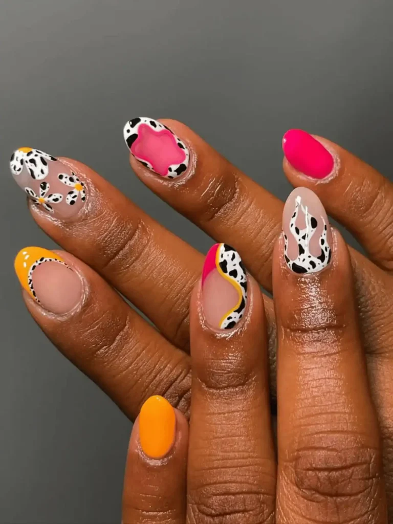 mixed design cow print nails