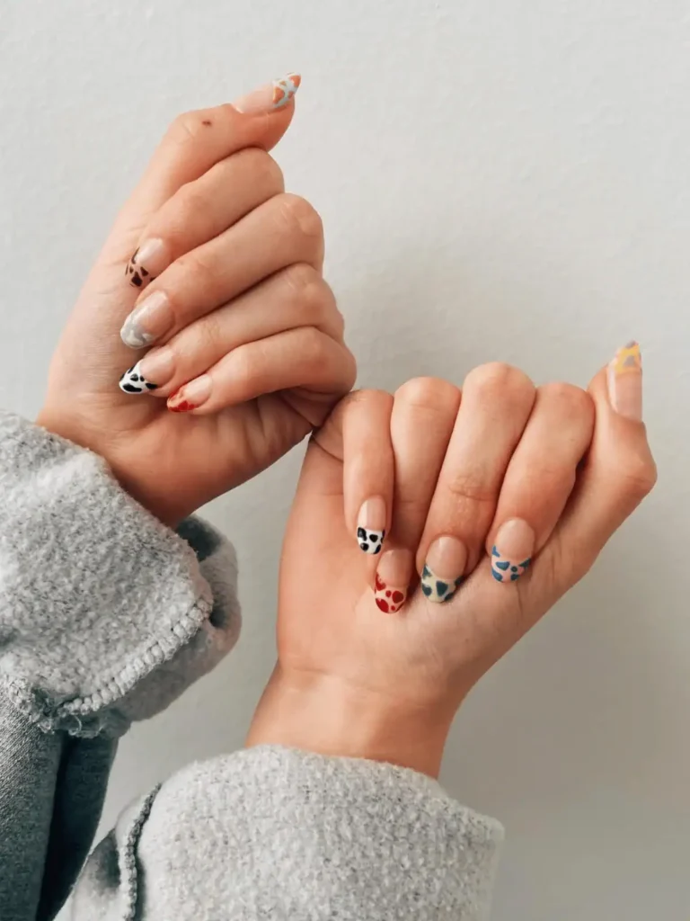 multicolour cow print nails