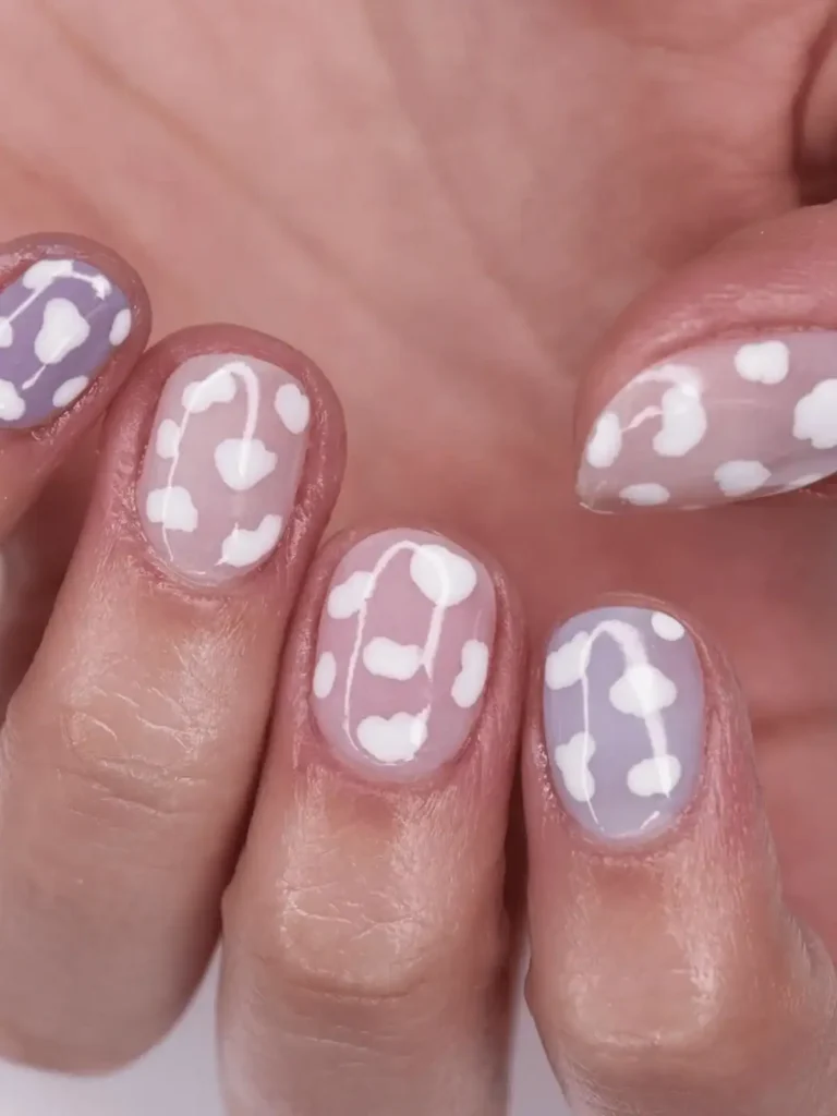 neutral cow print nails