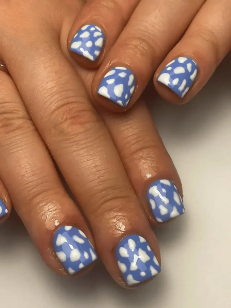 sky blue cow print nails