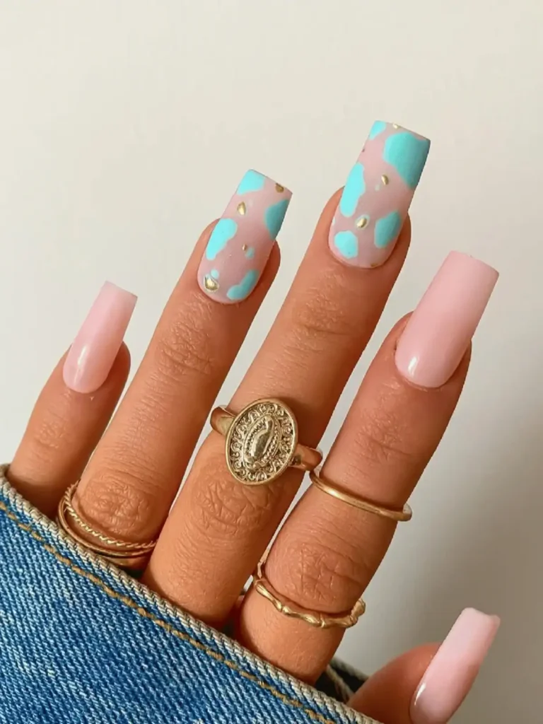 turquoise cow print nails