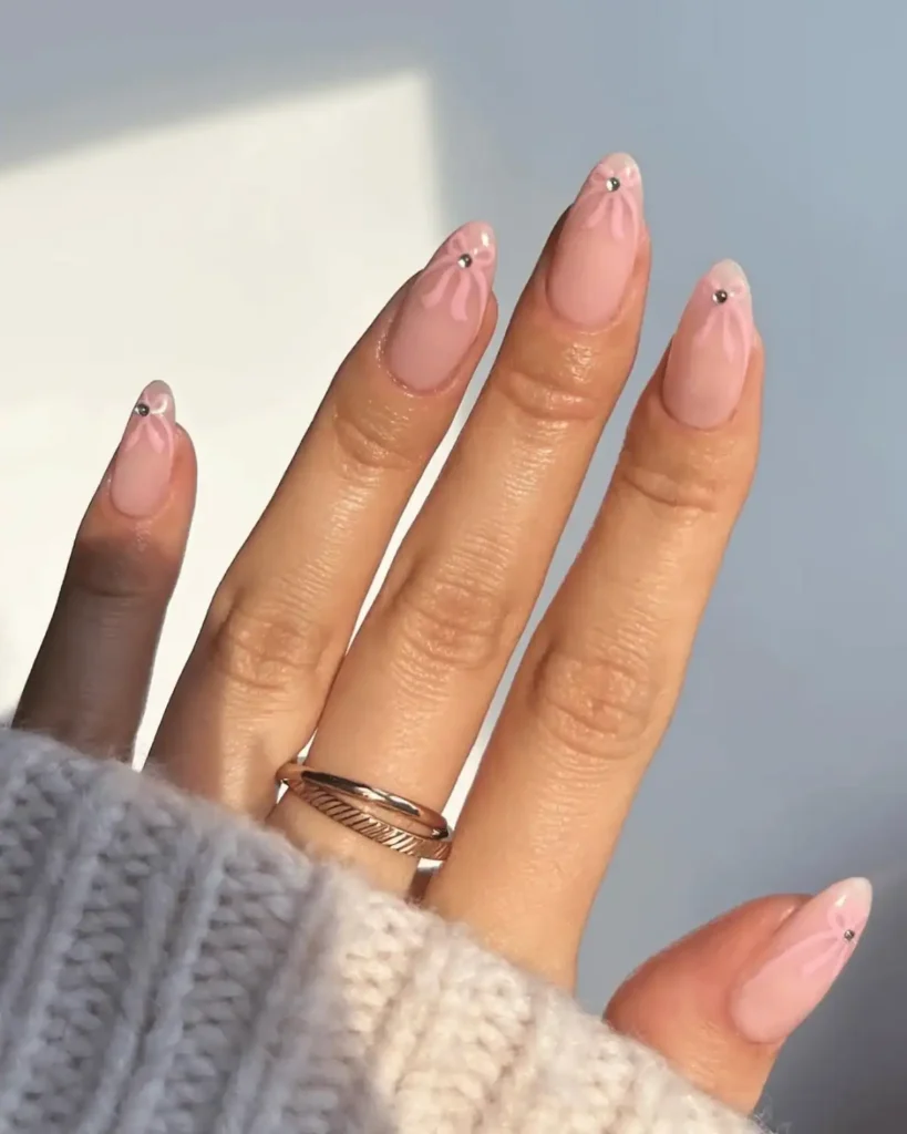 Pink bow nail design