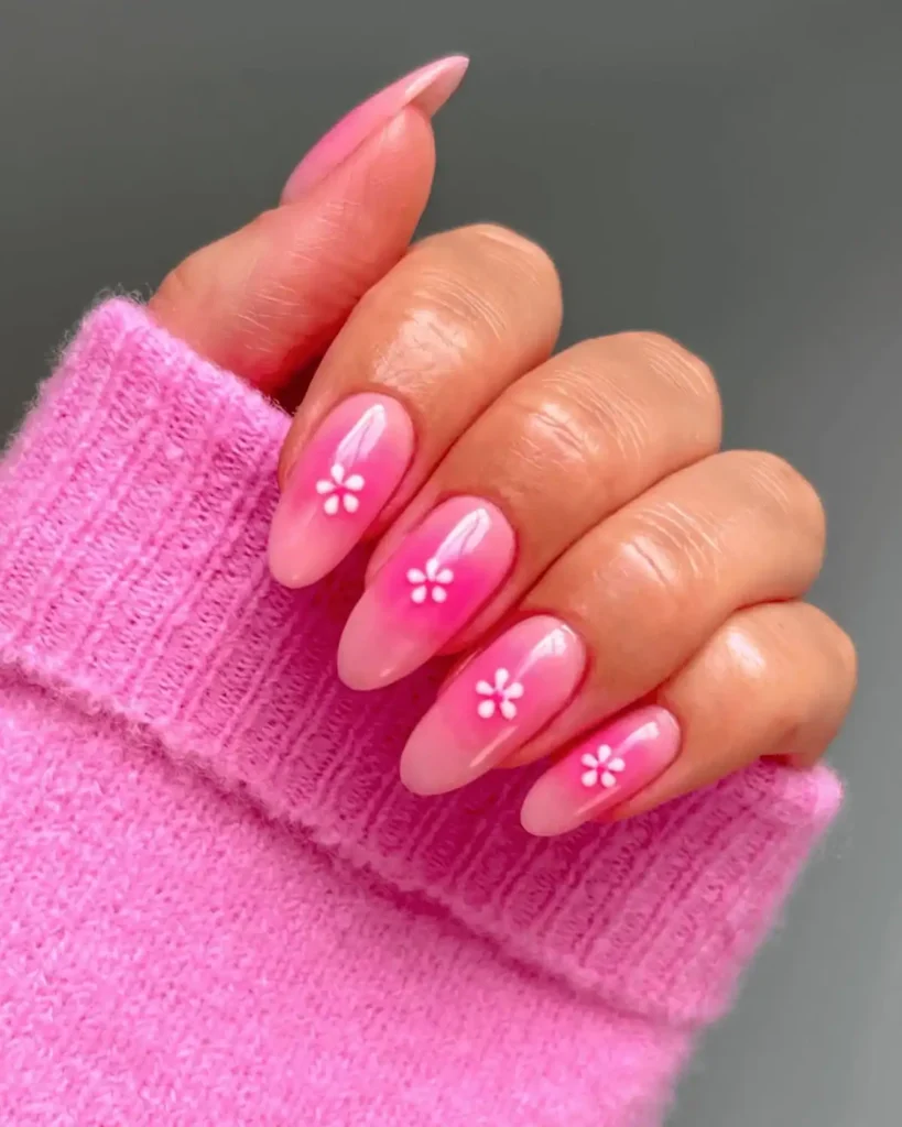 Pink daisy nail art.
