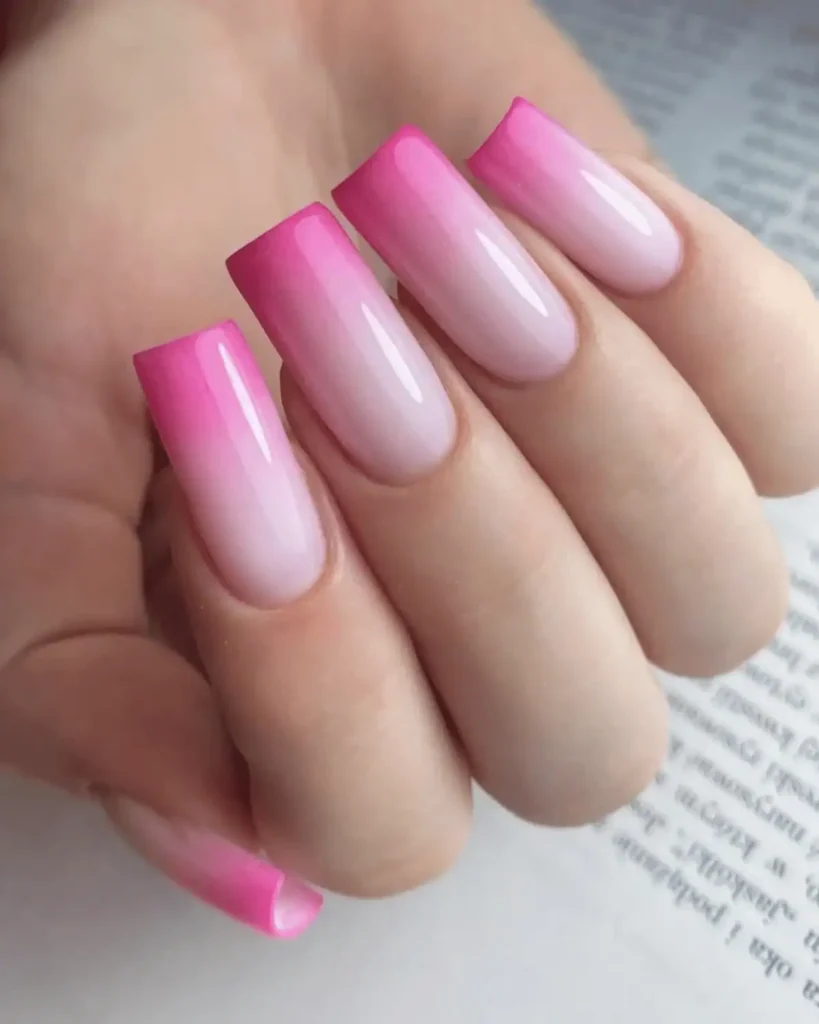 Pink ombre nail art design.