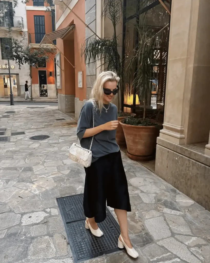 blonde woman wearing white slingback shoes
