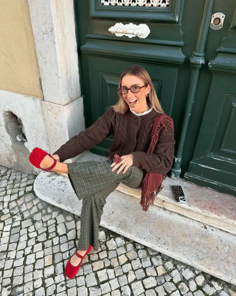 woman wearing an eclectic grandpa outfit with red shoes