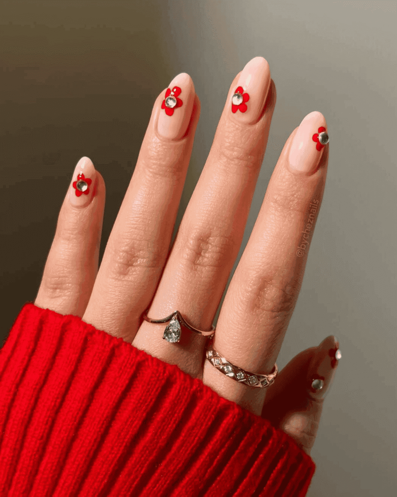 red flower and with diamante nails