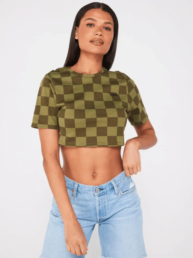 model wearing Y2K style green checkered crop top from Vans.  Checkerboard fashion pieces to buy
