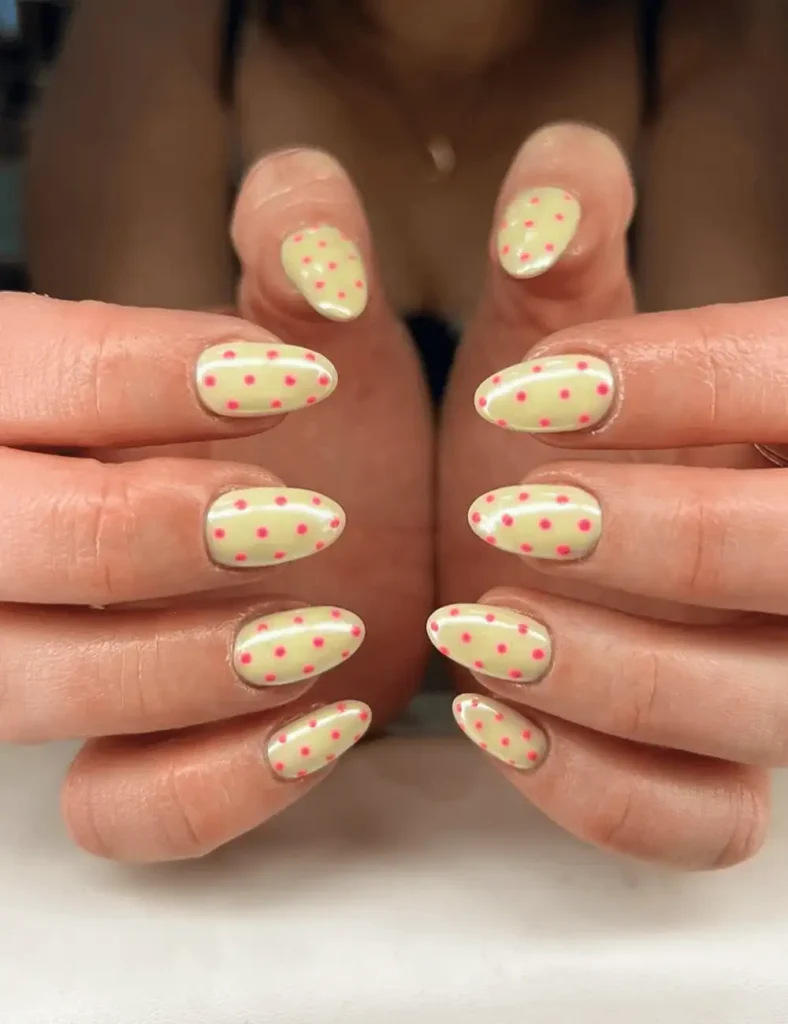 polka dot yellow nail design