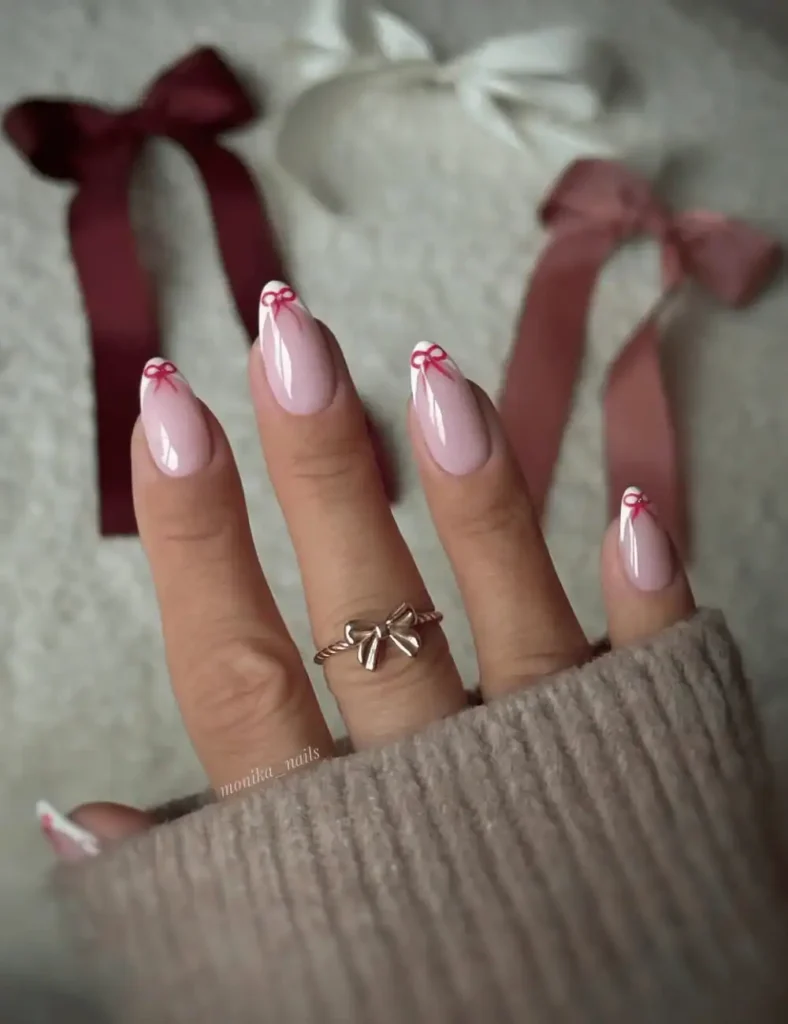 simple red bow white christmas nails