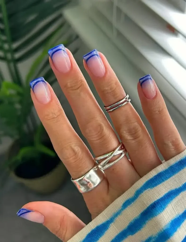 Electric-Blue-French-Tips.-blue-winter-nails-788x1024