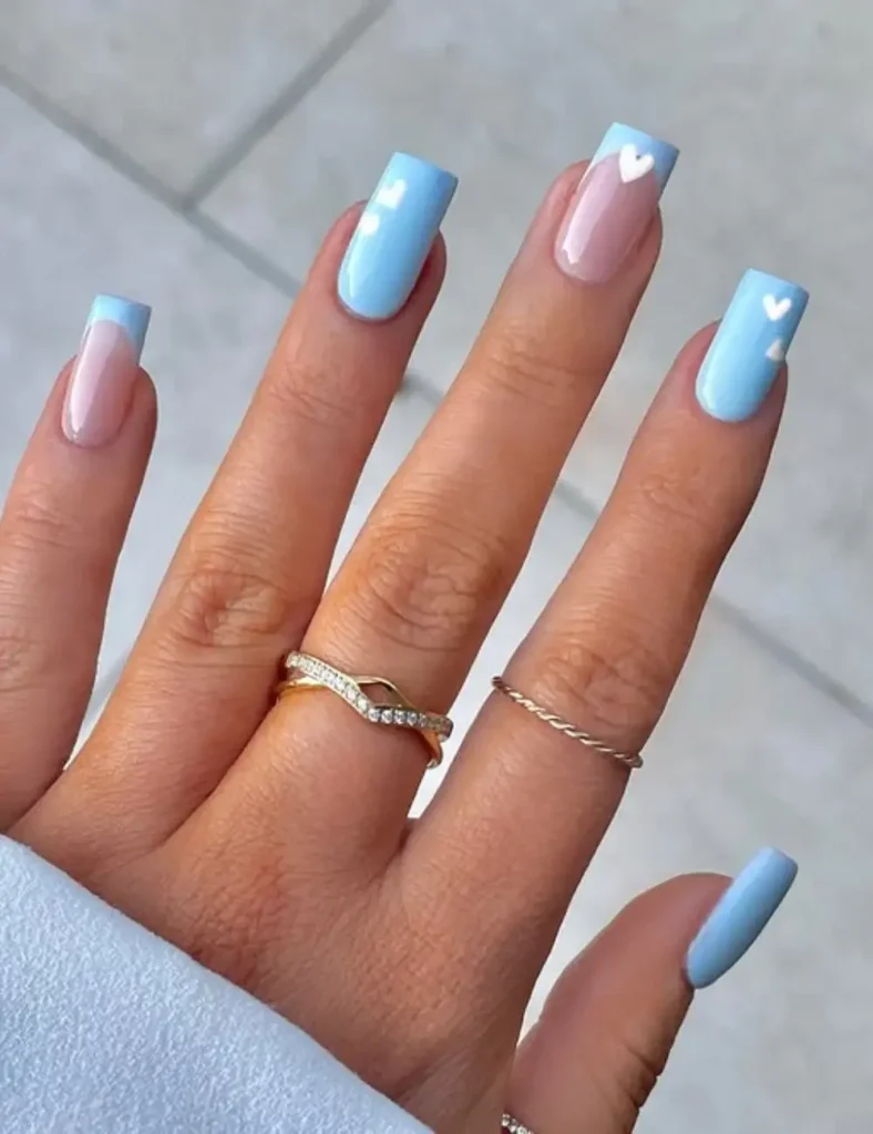blue-winter-nails-with-hearts-788x1024