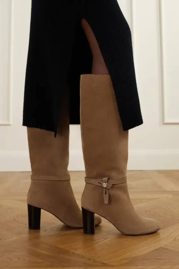 Pair of Tory Burch Roomy beige suede knee-high boots with slim ankle straps and stacked heels